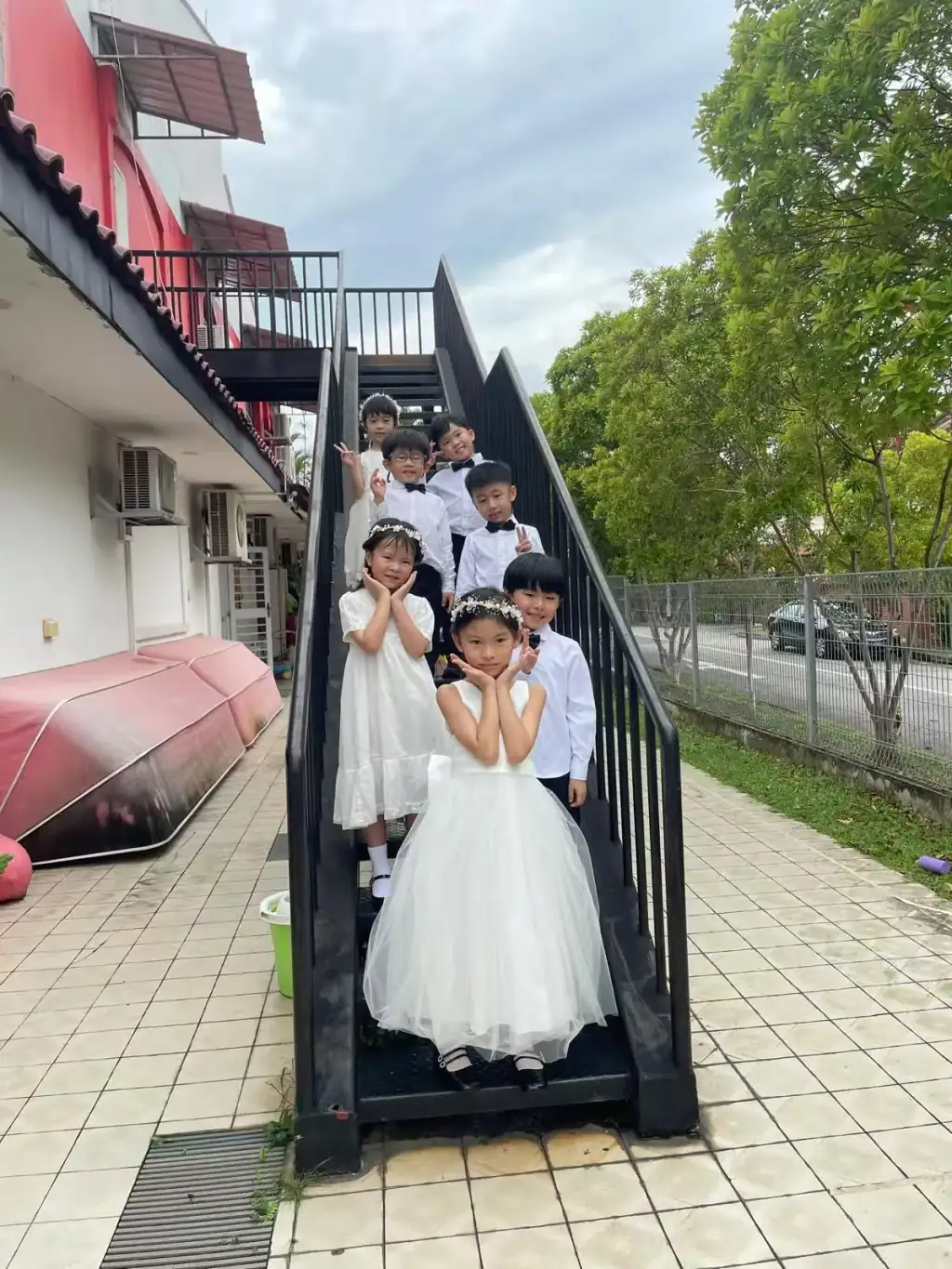Proud K2 graduates in caps and gowns at MapleBear Jurong West preschool graduation ceremony
