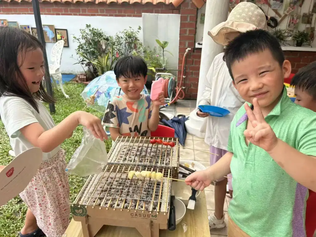 Children playing outdoors at MapleBear Jurong West bilingual preschool campus